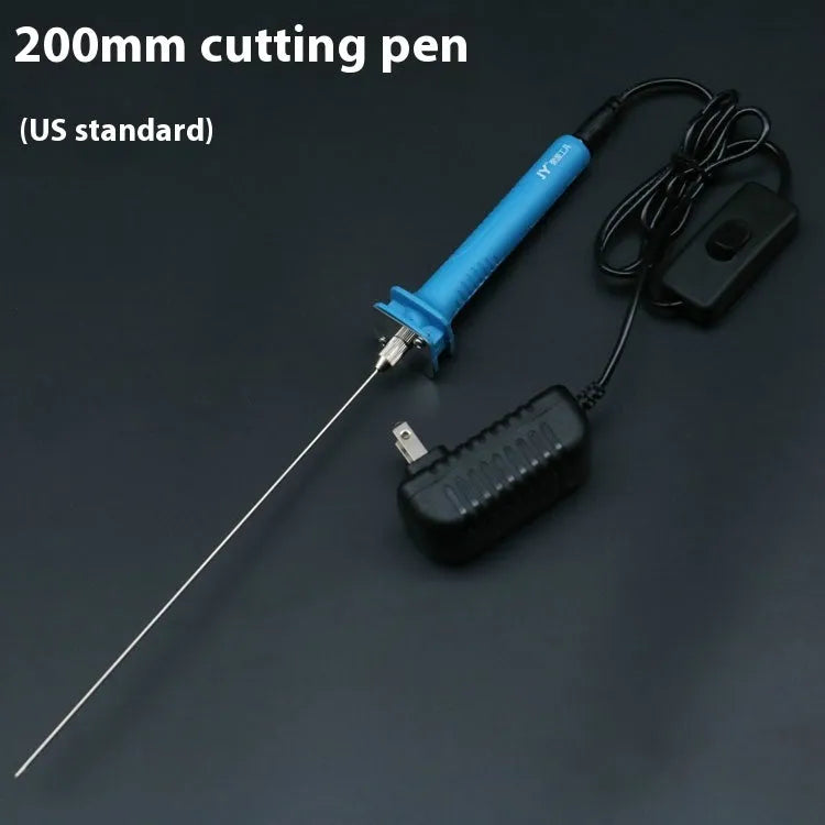 Blue plastic-handled electric foam cutter pen with adapter on a work surface.