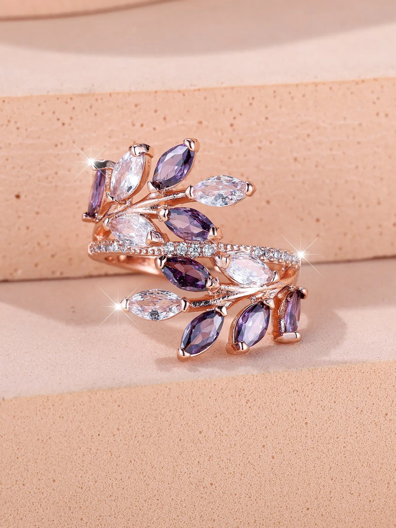 Adjustable copper leaf ring with a horse eye zircon stone in a choice of nine colour finishes.