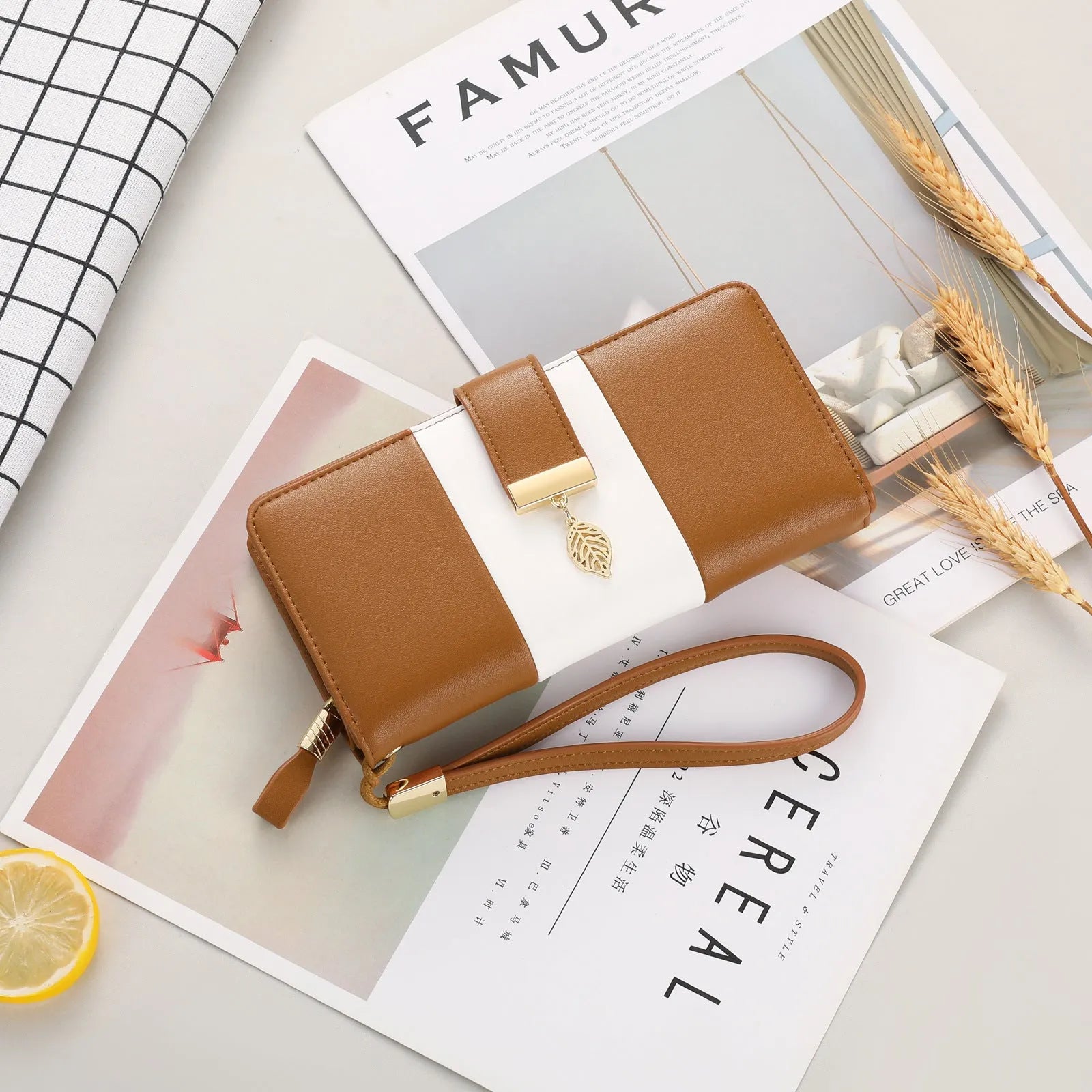 Anti-theft clutch bag in PU leather with zip lock closure, showing interior microfiber lining and compact design