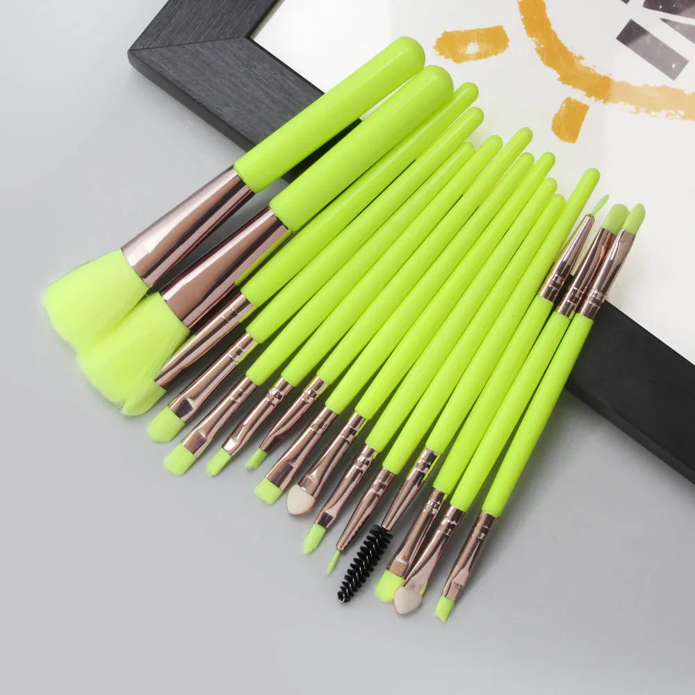 MAANGE 18-piece makeup brush set with fan-shaped cosmetic tools laid out on a table.