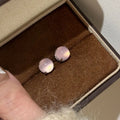 Chinese style chalcedony stud earrings with round egg surface stones in copper four-claw settings