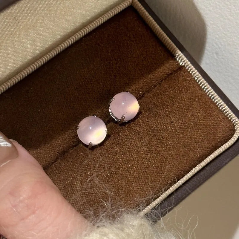 Chinese style chalcedony stud earrings with round egg surface stones in copper four-claw settings