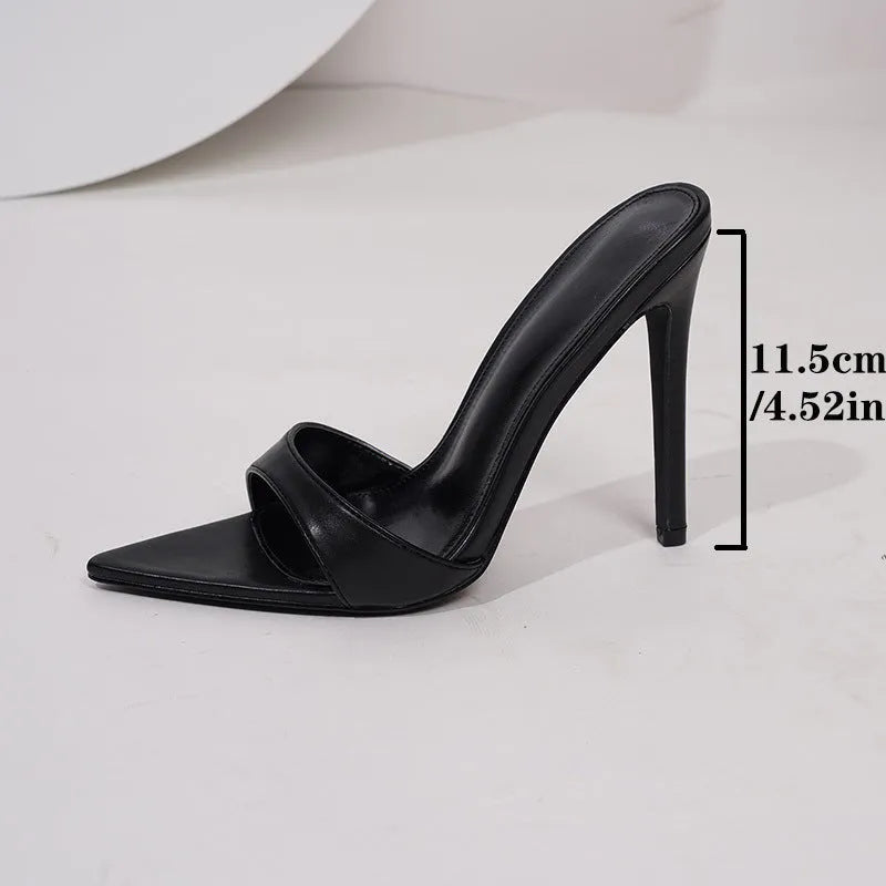 Ladies pointed high heels in black microfiber with a streamlined silhouette and European styling