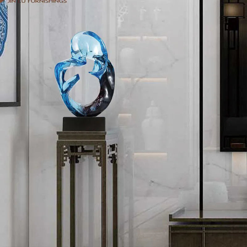 Transparent resin craft ornament in modern style, shown in blue and orange red colour options.