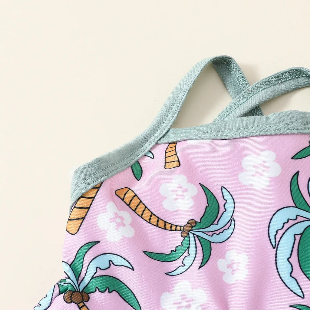 White sweet style girls' two-piece swimsuit set with shirt top and beach shorts on a hanger.