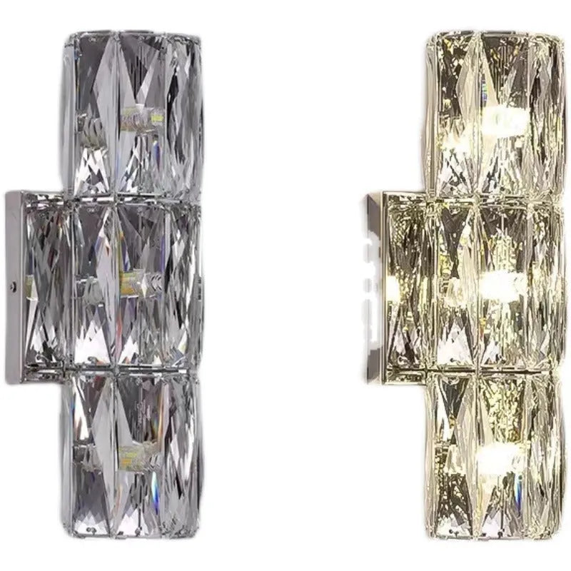 Modern crystal and stainless steel wall lamp in chrome finish with LED lighting.