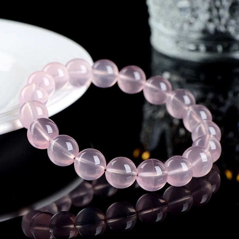 Natural crystal round beads women's bracelet with polished pink beads in single circle design