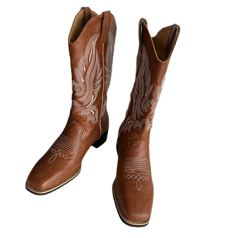 Brown women's mid-calf boots with embroidered pattern, square heel, and leather lining
