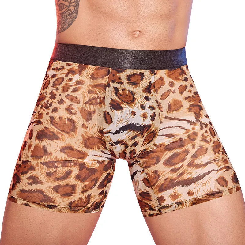Men's leopard print nylon boxer shorts on a white background.