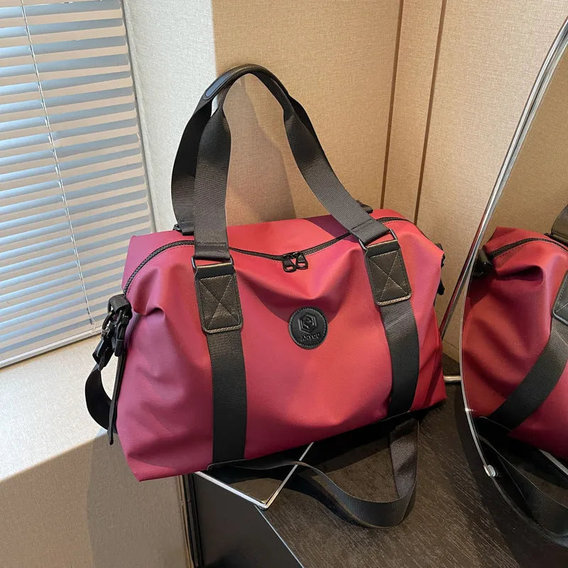 Large waterproof Oxford cloth travel bag in solid colour with 36-55L capacity for short-distance leisure travel