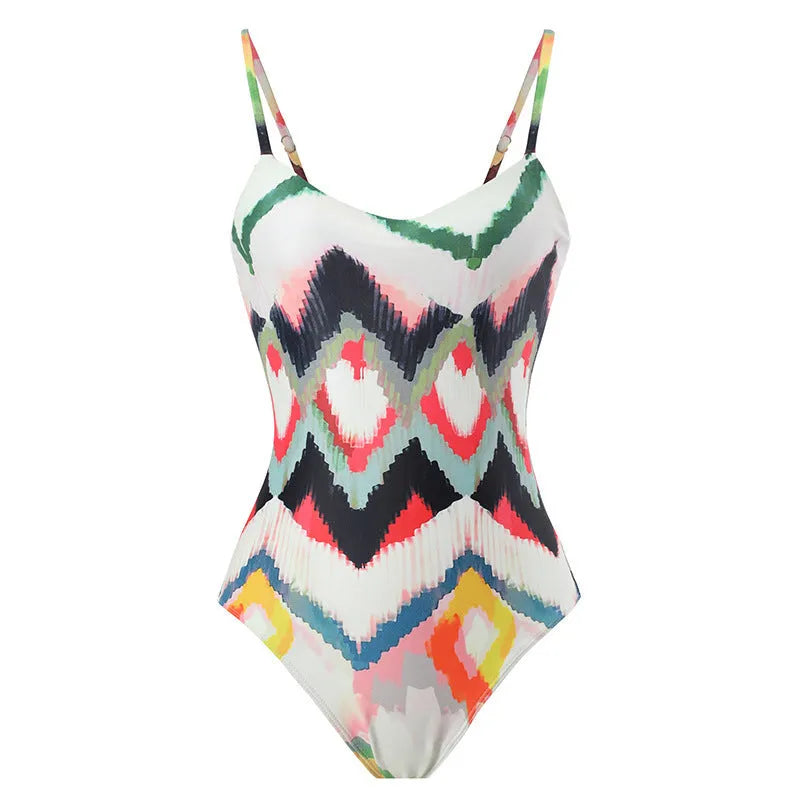 Women's two-piece striped swimsuit with matching hip skirt on beach