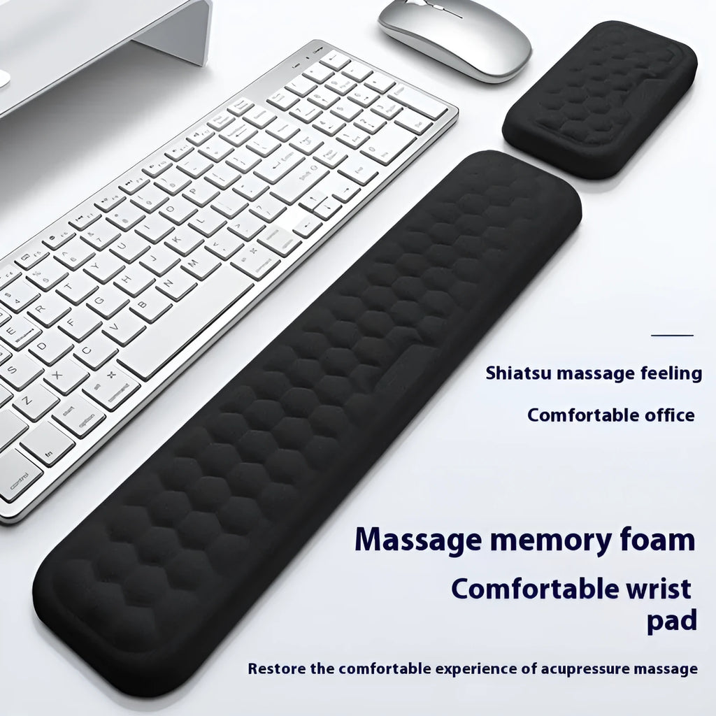 Memory foam mouse wrist rest pad with silicone base in black cloth cover option on desk