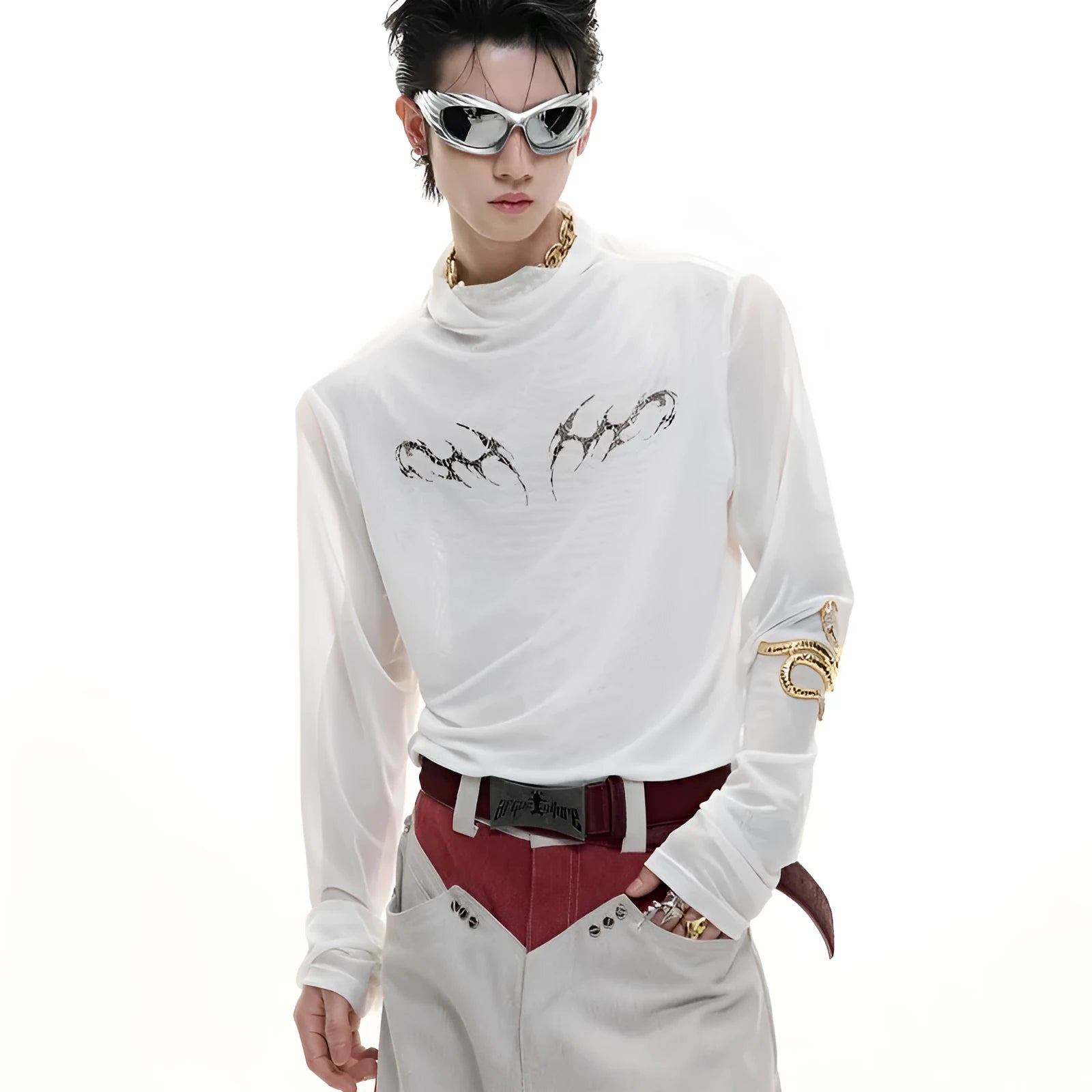 Man wearing a black slim fit long sleeve mesh base layer shirt.