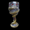 Red wine glass with gold 3D dragon resin design on stainless steel base.