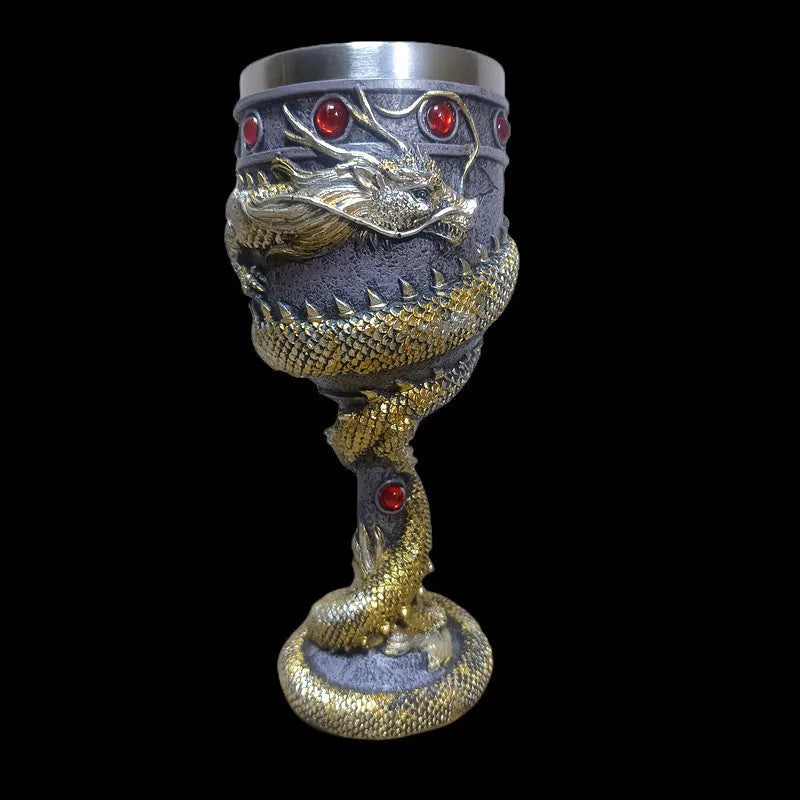 Red wine glass with gold 3D dragon resin design on stainless steel base.