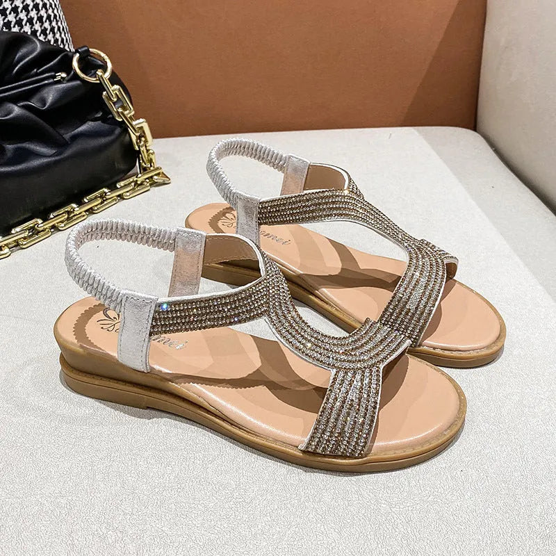 Gold women's PU patent leather beach sandals with rhinestones and a round toe.