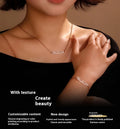 Stainless steel digital bracelet or necklace with diamond-set numbers on display, shown in gold colour.
