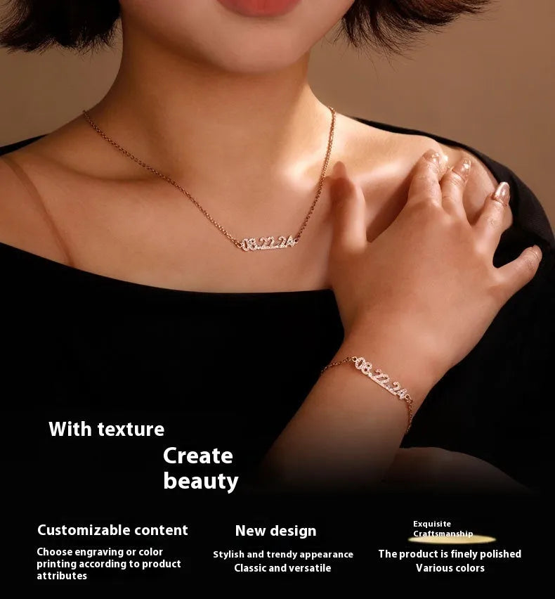 Stainless steel digital bracelet or necklace with diamond-set numbers on display, shown in gold colour.