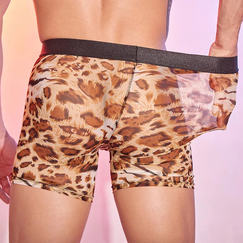 Men's leopard print nylon boxer shorts on a white background.