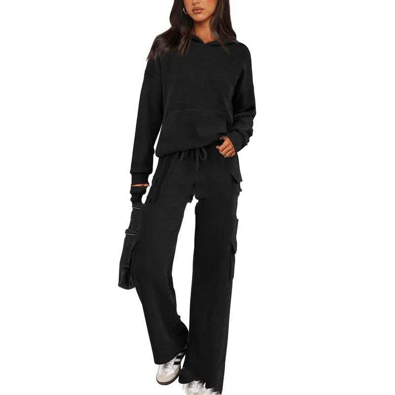 Women's polyester leisure sports suit set showing long sleeve top and matching trousers in multiple colour options