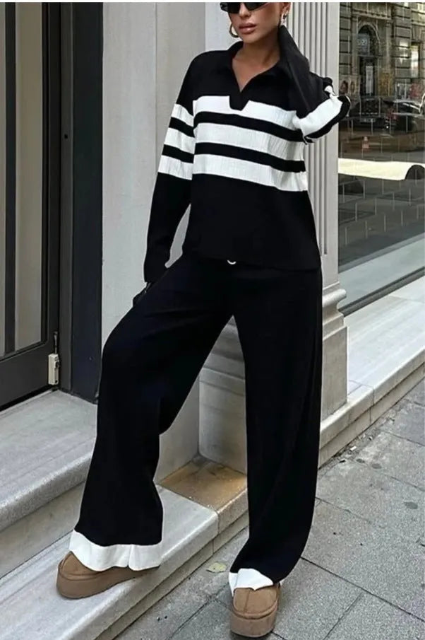 Women's black and white striped knitted two-piece set with polo collar and matching trousers