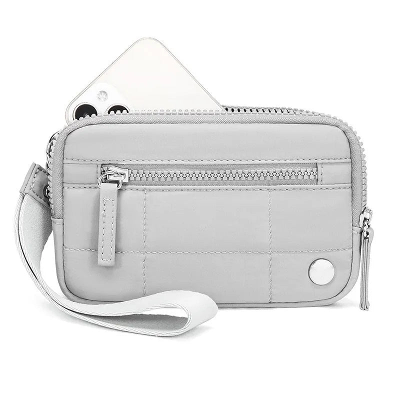 Waterproof quilted transparent deck handbag in nylon with solid colour lining