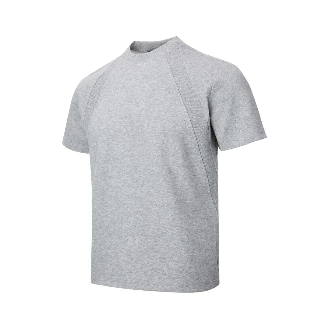 Short sleeve polyester top with textured air layer stitching in a loose fit.