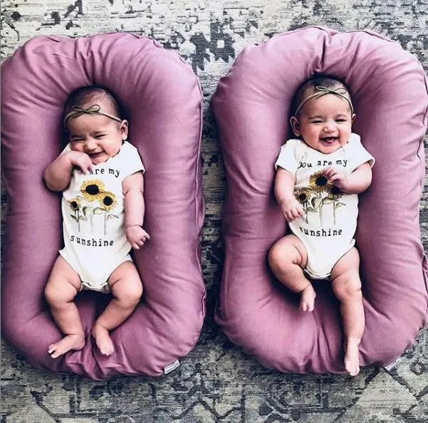 Portable baby nest crib measuring 75x45cm in cotton with PP cotton filler