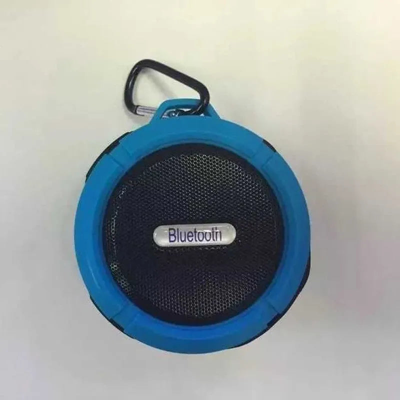 Waterproof portable Bluetooth speaker in multiple colours with mountaineering buckle attachment