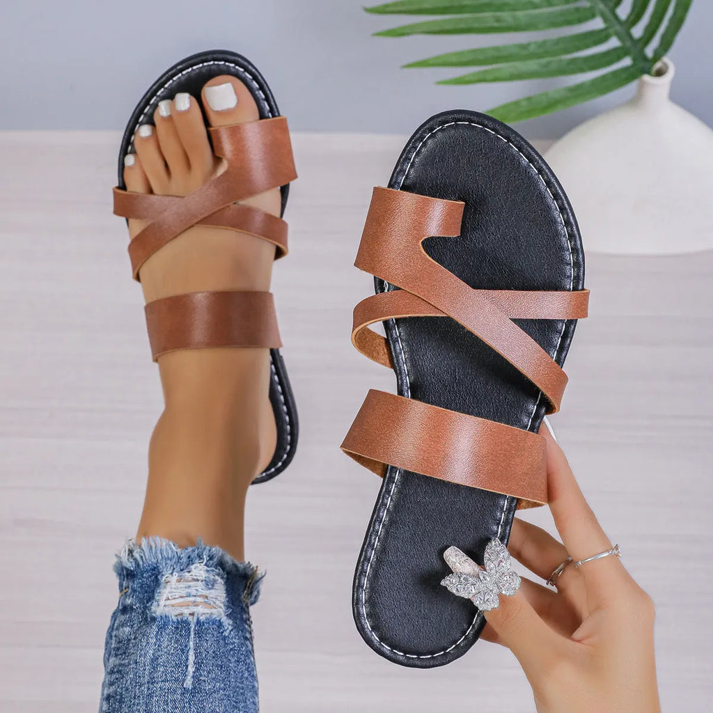 Round head casual beach slippers in black, brown, or wine red with hollow-out design and rubber soles