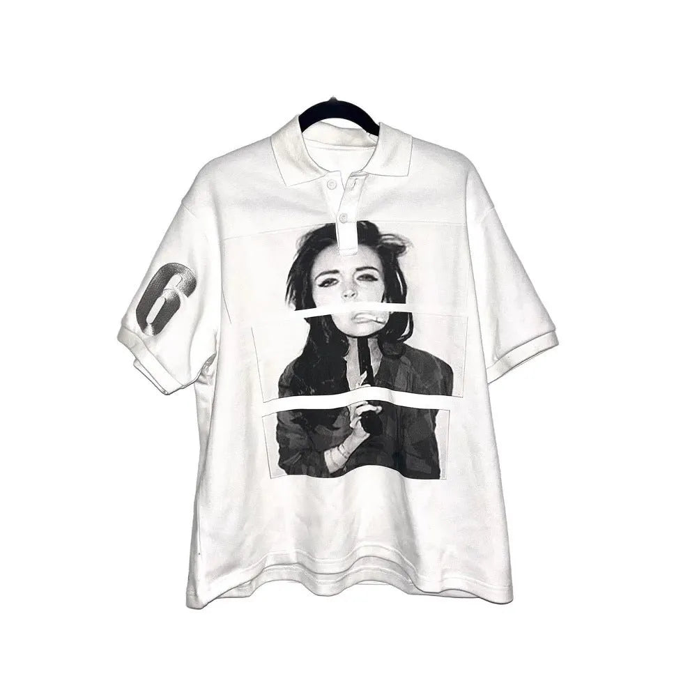 Short-sleeved polyester polo shirt with a printed pattern in a straight, medium-length cut.