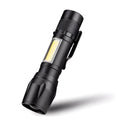 Black aluminium alloy telescopic LED flashlight with pocket clip, shown zoomed in and out.