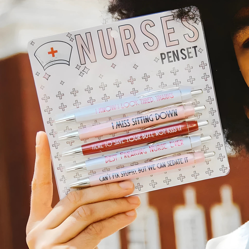 Set of five nurse-themed ballpoint pens with humorous nursing copywriting printed on plastic barrels