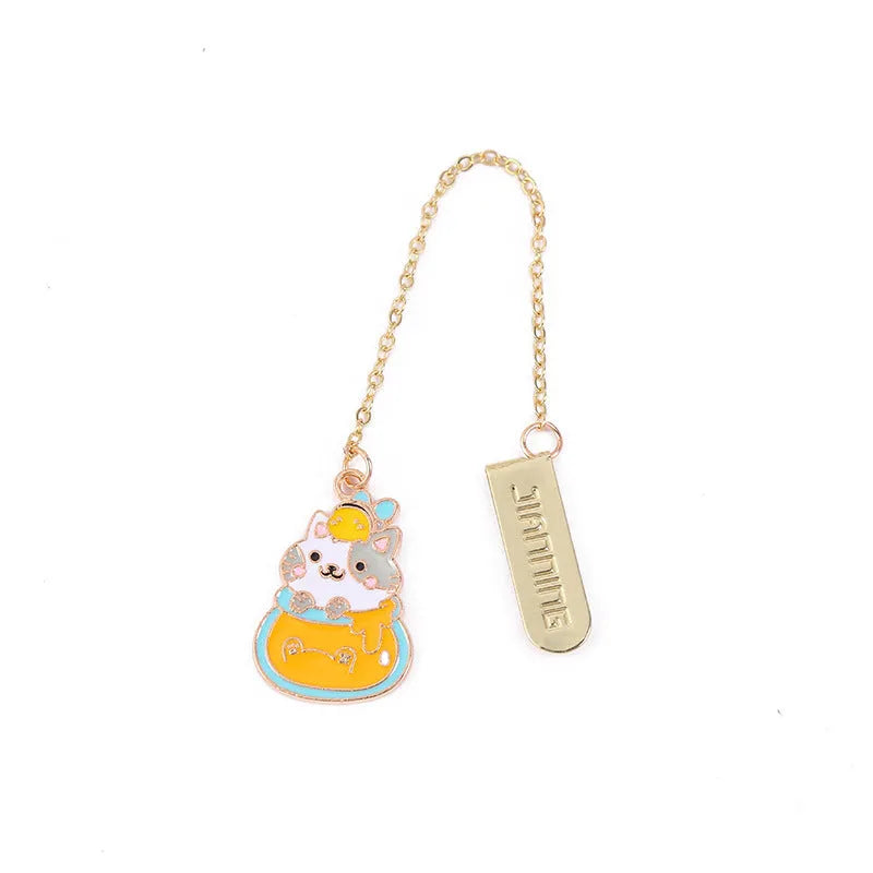 Jane Lime metal bookmark with cartoon cat pendant in four designs measuring 3.8x18.3cm