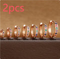 Circle zircon perforated stud earrings in gold, rose gold, and silver colours showing geometric round design with multiple size options