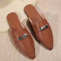 Light brown women's pointed-toe casual slippers with a low heel and rubber sole.