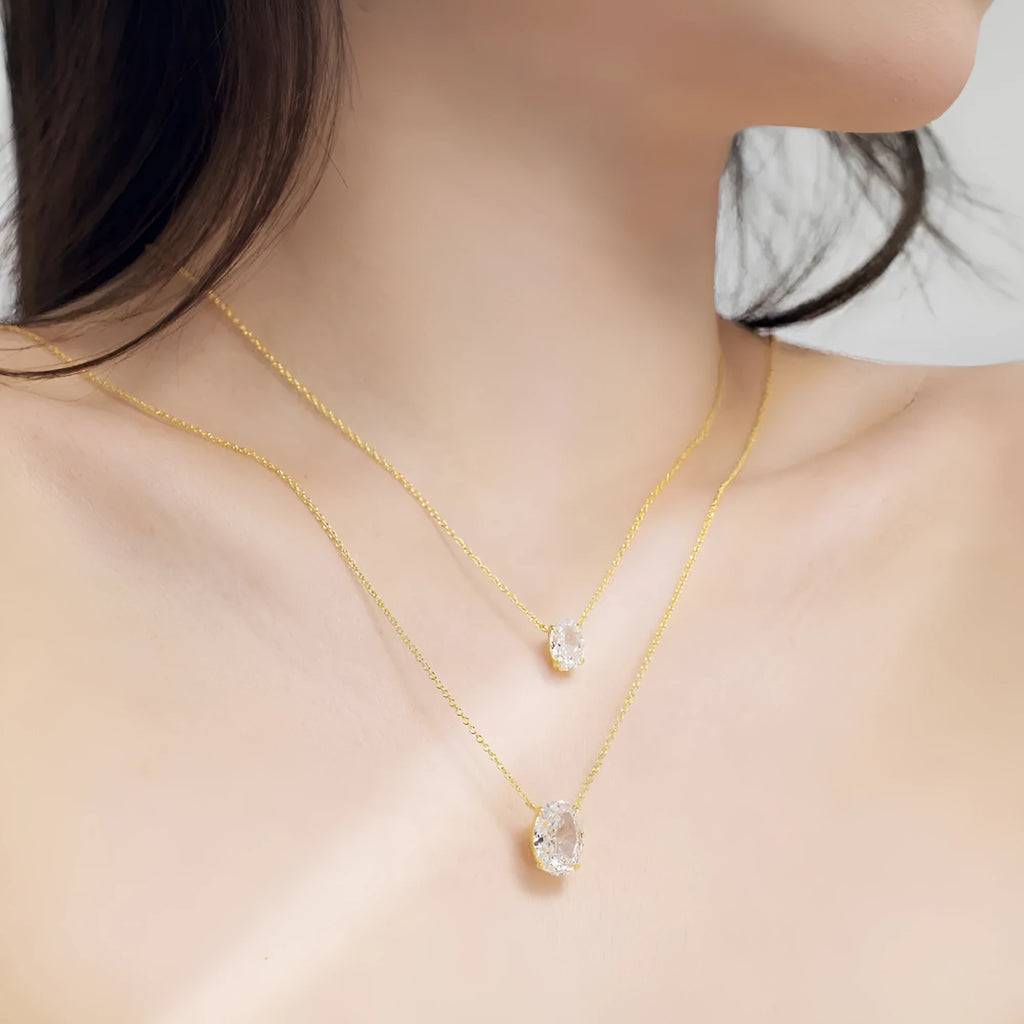 Sterling silver necklace with geometric oval ice flower pendant in gold plating