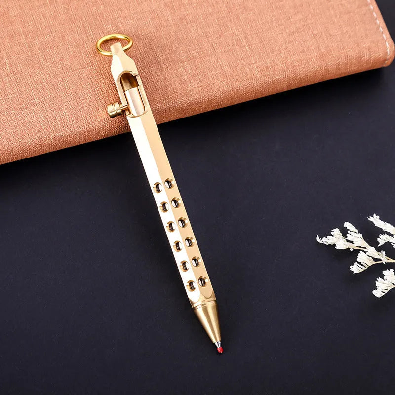 Brass hexagonal roller pen with 0.5mm tip showing six flat sides and retro design