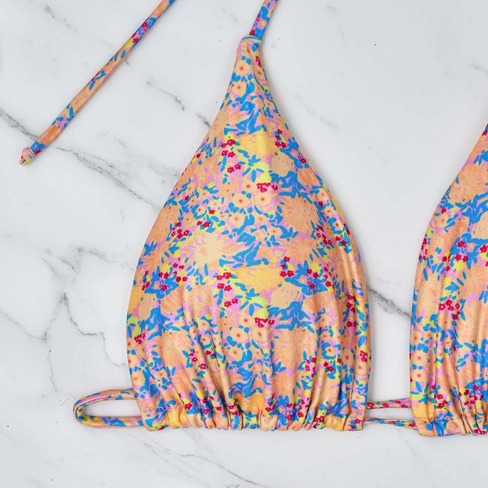 Lace-up bikini swimsuit with backless design and split briefs in polyester fabric