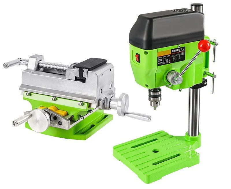Bench drilling machine with cross bench pliers on workbench