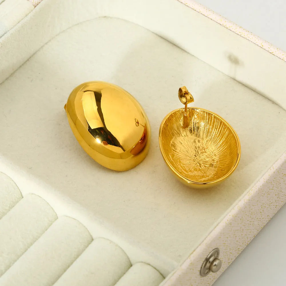 Geometric line ear studs with gold electroplated finish and glazed surface