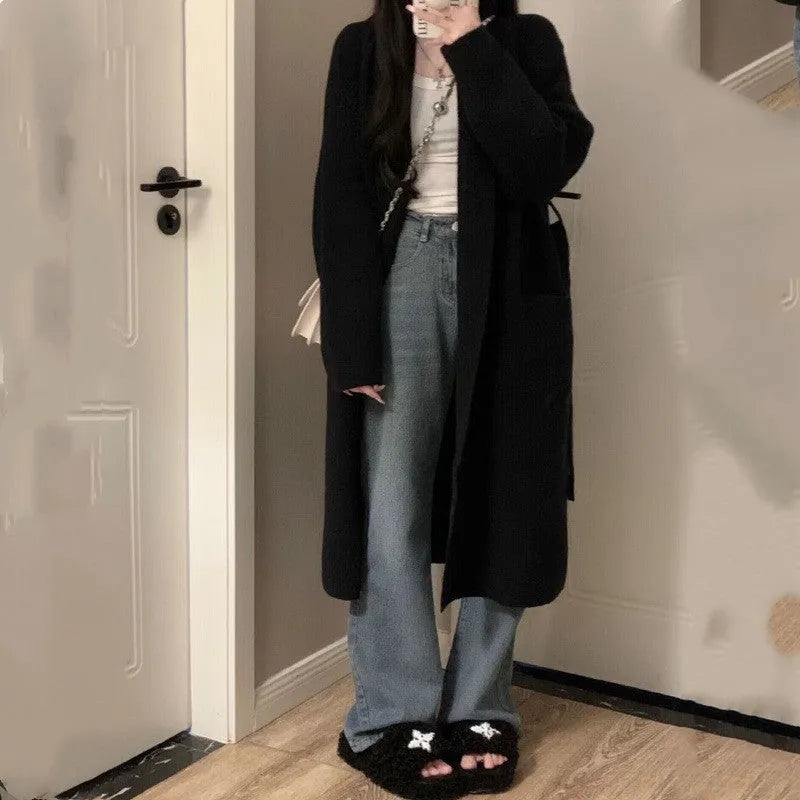 Women's loose knitted cardigan in chenille fabric showing 65cm length and solid colour options