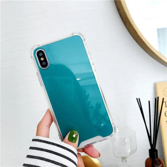 Mirrored back protective TPU case for iPhone on a table
