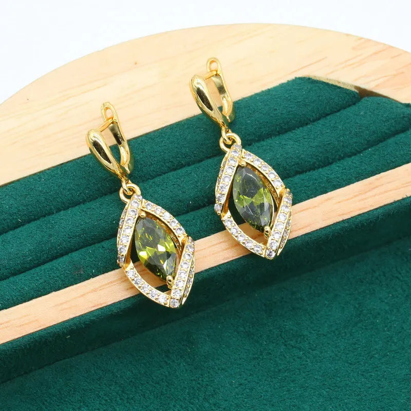 Olive green anti-allergy AAA zircon jewellery set with necklace, ring, bracelet, and earrings on display