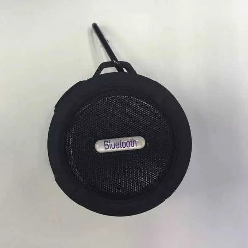 Waterproof portable Bluetooth speaker in multiple colours with mountaineering buckle attachment