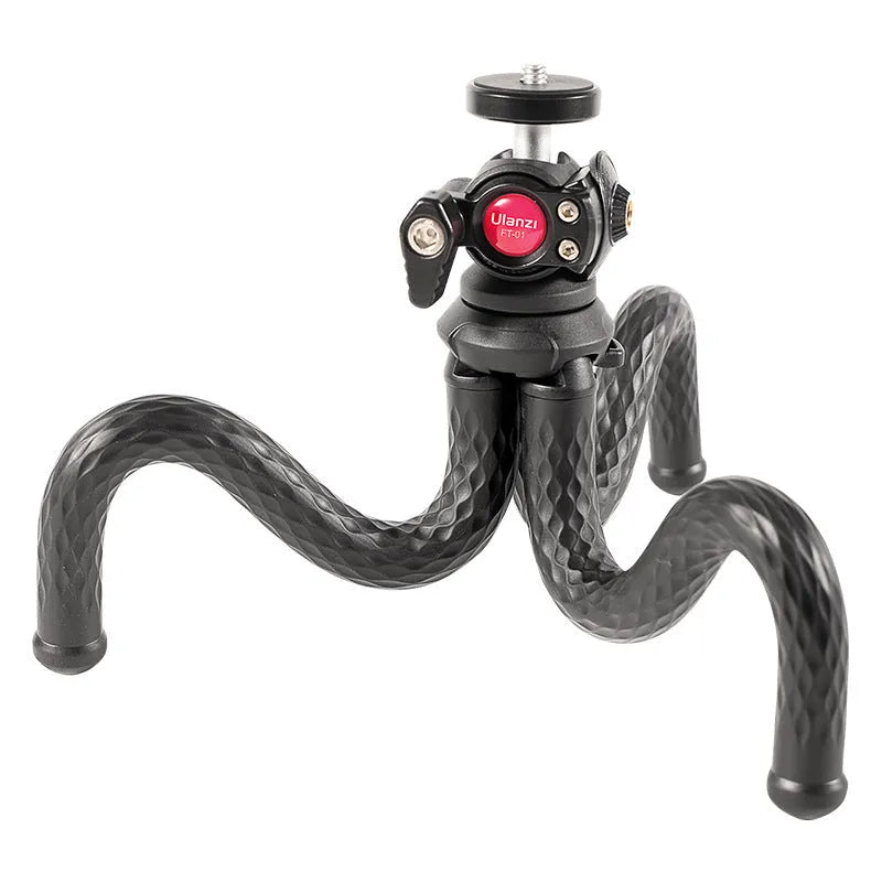 Black octopus leg tripod with extended aluminium shaft and attached mobile phone clip