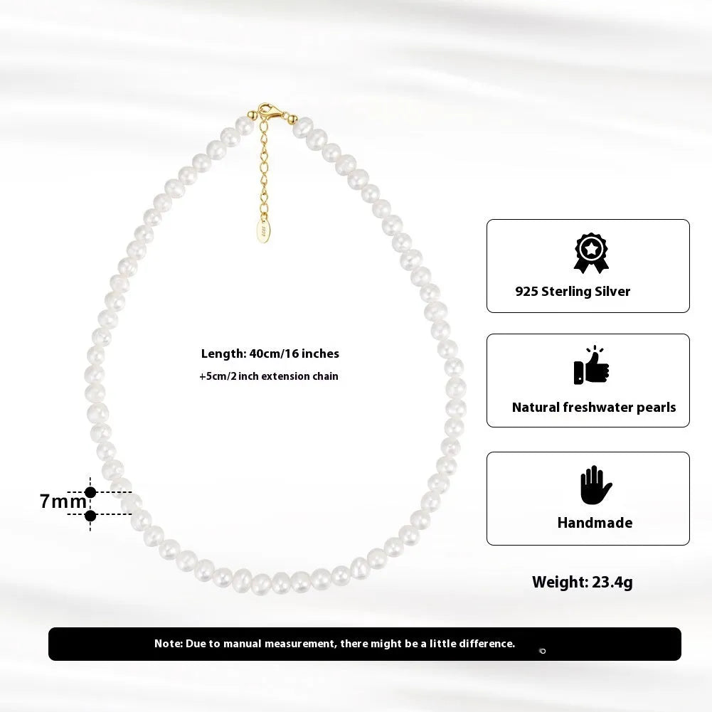 Women's silver adjustable necklace with a single natural freshwater pearl centre.