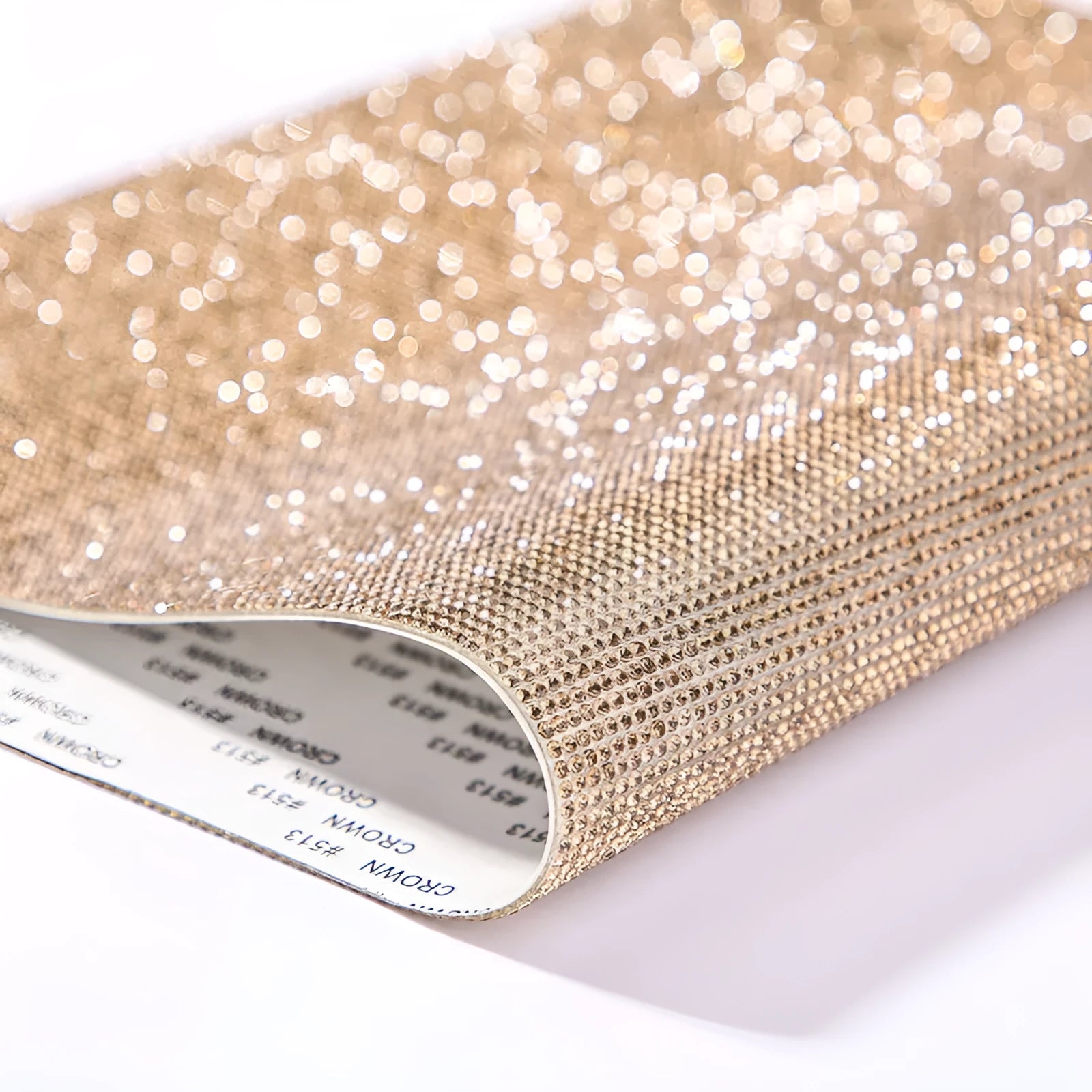 Rhinestone adhesive sheet with eight-eye pattern in multiple colour options on white background