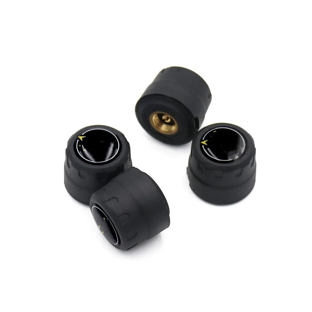 Bluetooth 5.0 tyre pressure monitoring system with four black external sensors, a wrench, and anti-theft screws.