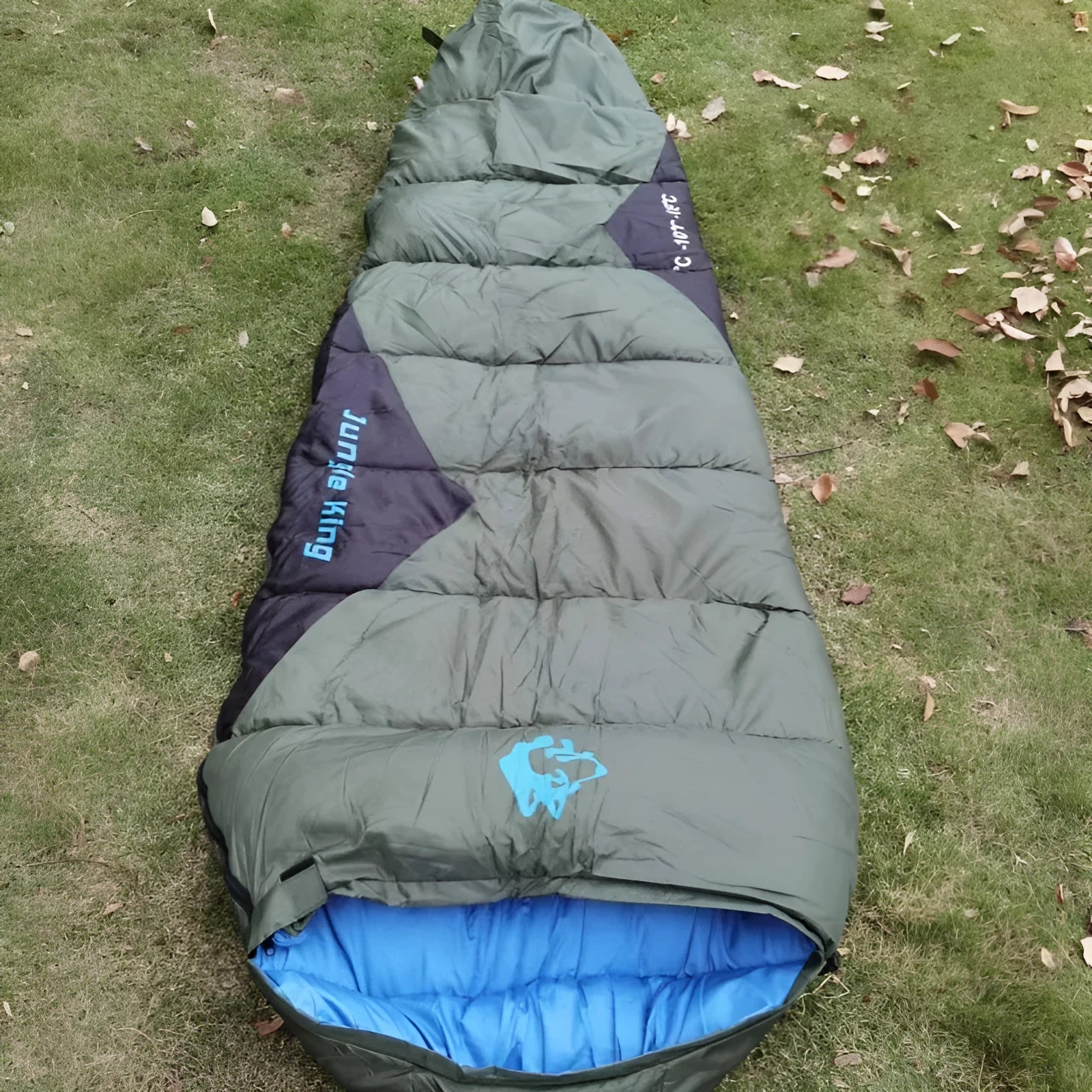 Mummy-style outdoor sleeping bag in Army Green with compression sack, shown with dimensions 230x80x50cm.
